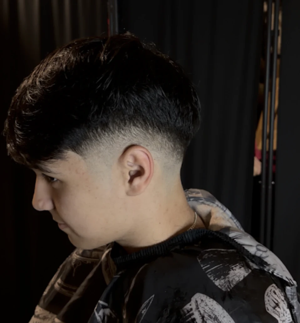 Sharp low fade with textured top — Jabon's Chair